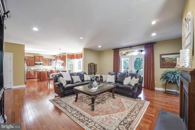 1901 Eamons Way, Annapolis, MD 21401 - living area featuring light wood finished floors, recessed lighting, and a fireplace with flush hearth