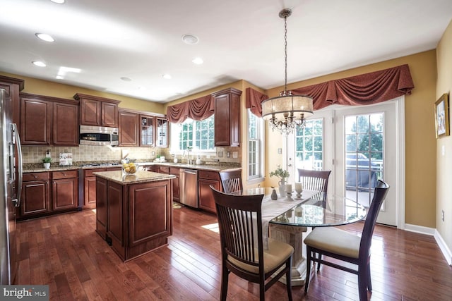 1901 Eamons Way, Annapolis, MD 21401 - kitchen with appliances with stainless steel finishes, dark wood-style floors, a chandelier, tasteful backsplash, and recessed lighting