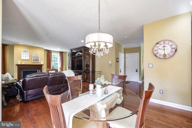 1901 Eamons Way, Annapolis, MD 21401 - dining room featuring a chandelier, dark wood finished floors, a fireplace, and recessed lighting