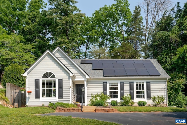 1470 Willow Lake Dr, Charlottesville, VA 22902 - view of front of home featuring roof mounted solar panels and roof with shingles