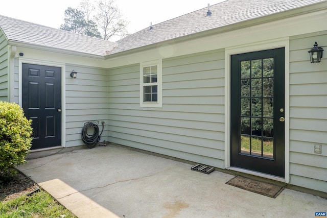 1470 Willow Lake Dr, Charlottesville, VA 22902 - property entrance with a patio area and a shingled roof