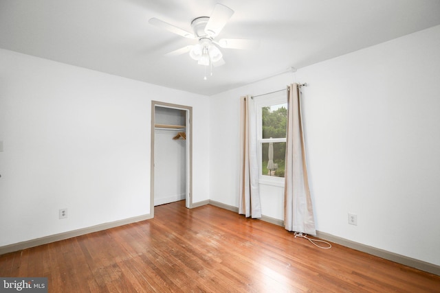 407 Pratt St, Fredericksburg, VA 22405 - unfurnished bedroom with light wood finished floors, a closet, and a ceiling fan