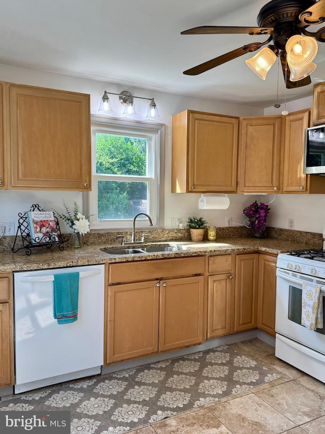 407 Pratt St, Fredericksburg, VA 22405 - kitchen with white appliances, ceiling fan, and stone counters