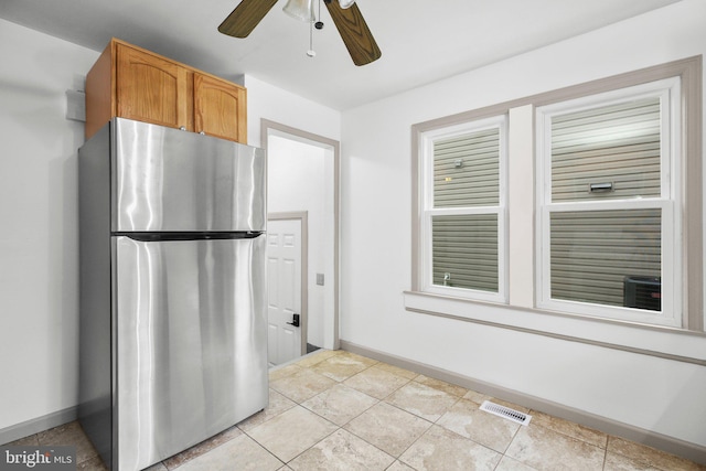 407 Pratt St, Fredericksburg, VA 22405 - kitchen with freestanding refrigerator and a ceiling fan