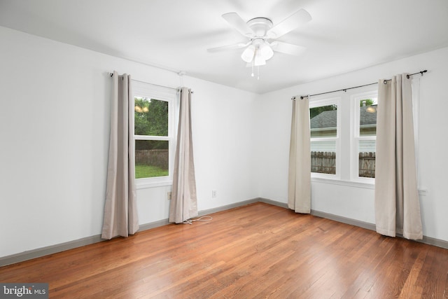 407 Pratt St, Fredericksburg, VA 22405 - empty room with light wood finished floors and a ceiling fan