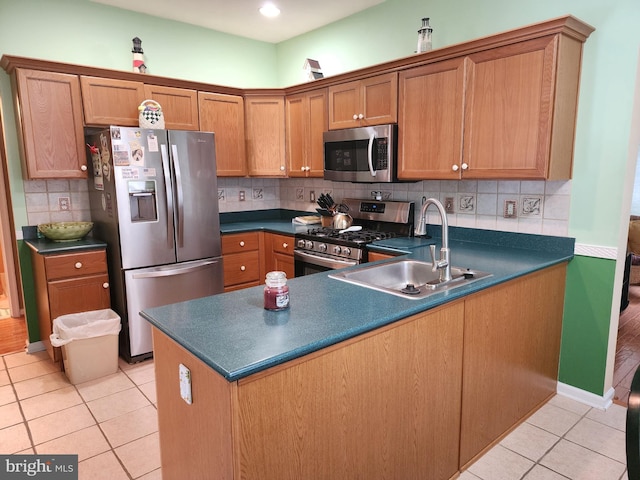 33 Sunset Ln, Columbus, NJ 08022 - kitchen featuring appliances with stainless steel finishes, dark countertops, and light tile patterned flooring