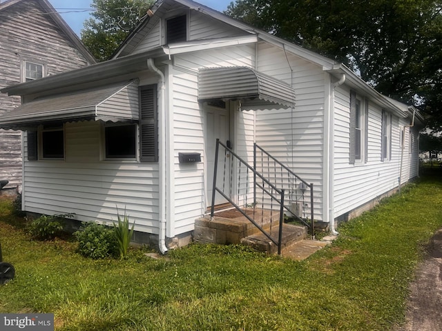 307 Willow St, Snow Hill, MD 21863 - view of side of property featuring a lawn