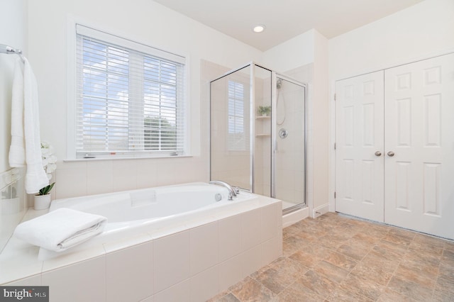 22 Stone Barn Rd, Mechanicsburg, PA 17050 - full bathroom featuring a bath, a stall shower, and stone finish flooring