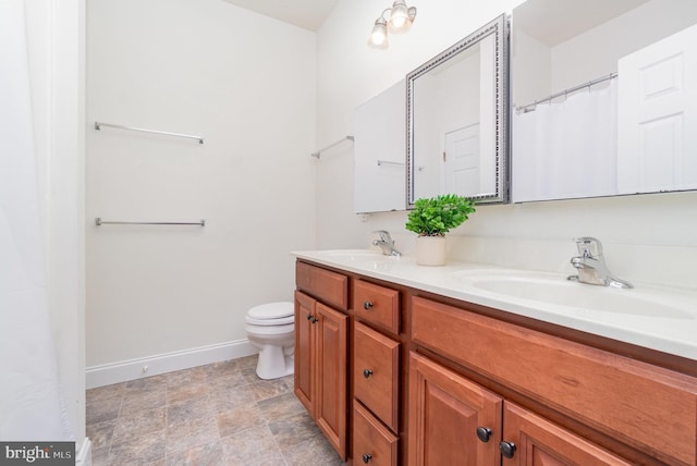 22 Stone Barn Rd, Mechanicsburg, PA 17050 - bathroom with double vanity and baseboards