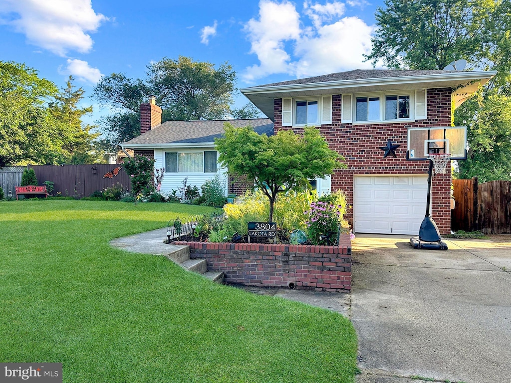 3804 Lakota Rd, Alexandria, VA 22303 - view of front of home featuring driveway, a garage, brick siding, and a chimney