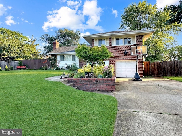 3804 Lakota Rd, Alexandria, VA 22303 - view of front facade with driveway, brick siding, an attached garage, and a chimney