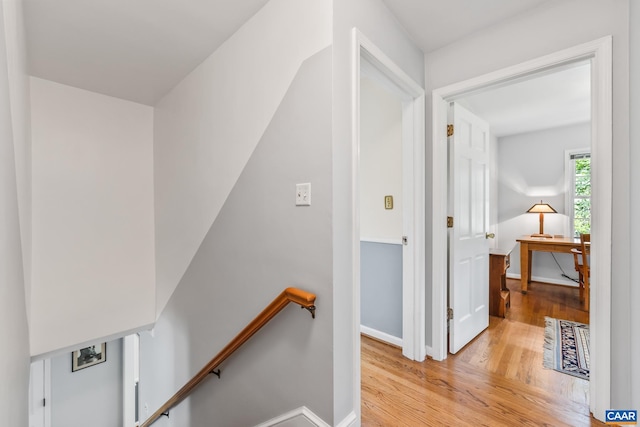 2402 Bennington Rd, Charlottesville, VA 22901 - corridor with wood finished floors and an upstairs landing