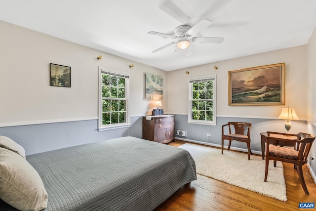 2402 Bennington Rd, Charlottesville, VA 22901 - bedroom featuring multiple windows, wood finished floors, and ceiling fan