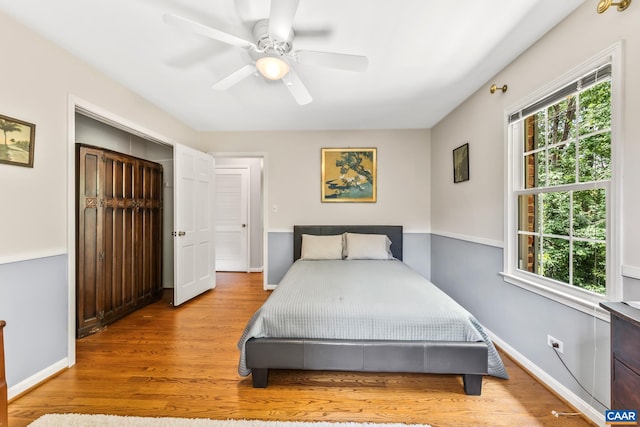 2402 Bennington Rd, Charlottesville, VA 22901 - bedroom with multiple windows, wood finished floors, ceiling fan, and a closet