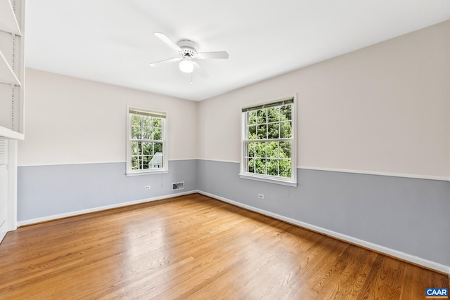 2402 Bennington Rd, Charlottesville, VA 22901 - spare room featuring healthy amount of natural light, a ceiling fan, and wood finished floors