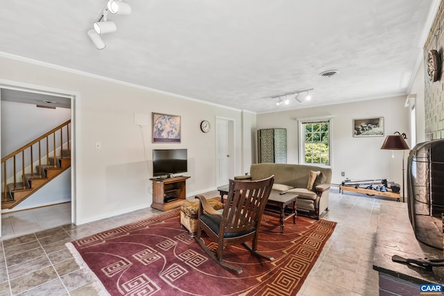 2402 Bennington Rd, Charlottesville, VA 22901 - tiled living room with track lighting, stairs, and crown molding