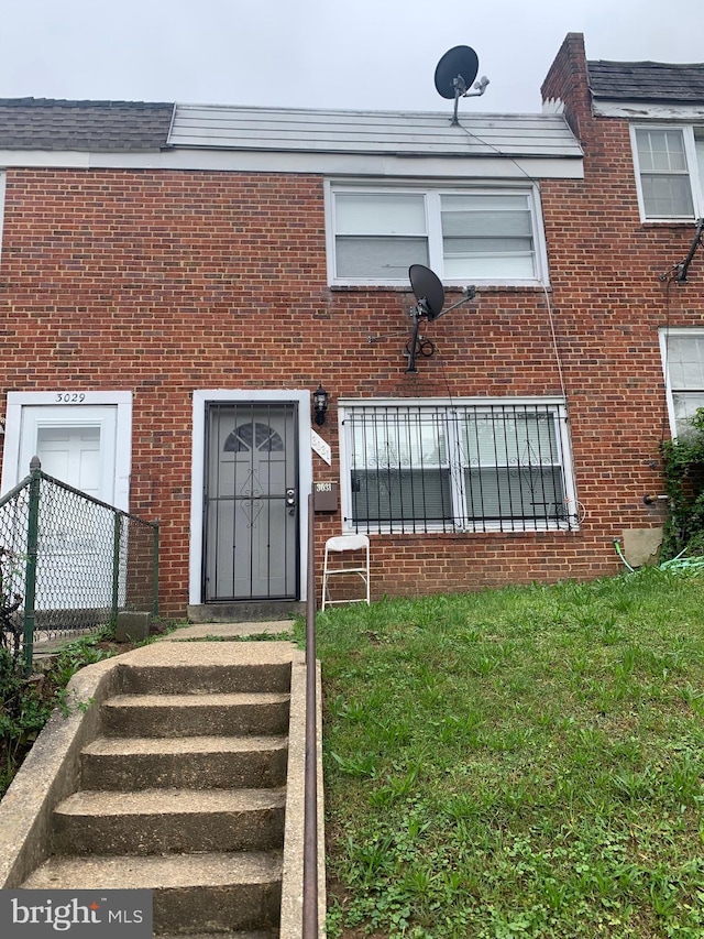 3031 Elizabeth Ave, Baltimore, MD 21230 - entrance to property with brick siding