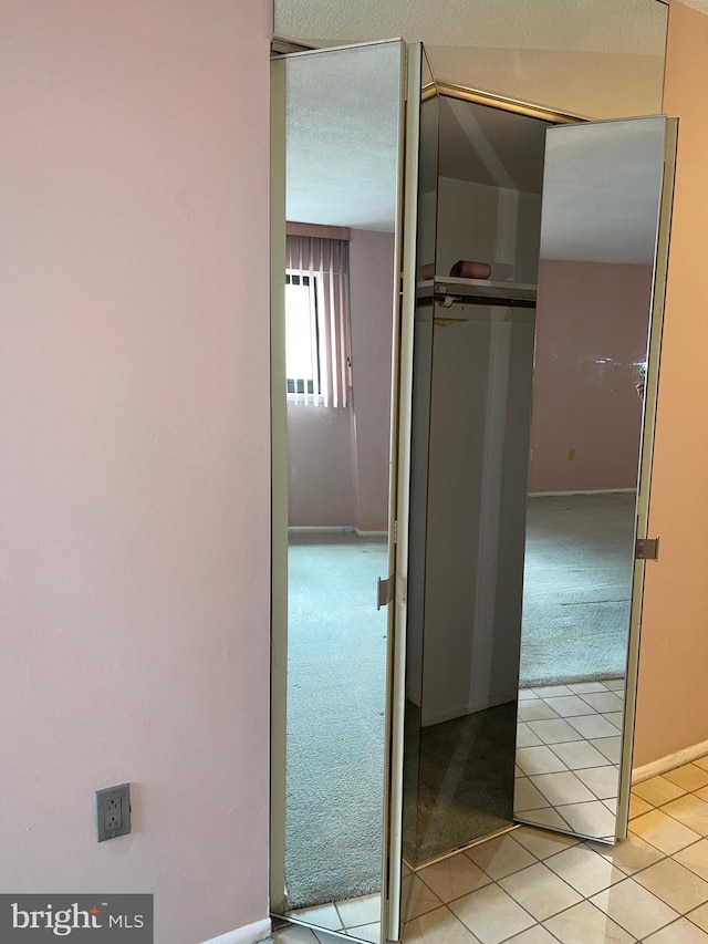 1420 Locust St Unit 20Q, Philadelphia, PA 19102 - corridor with light tile patterned floors and light carpet