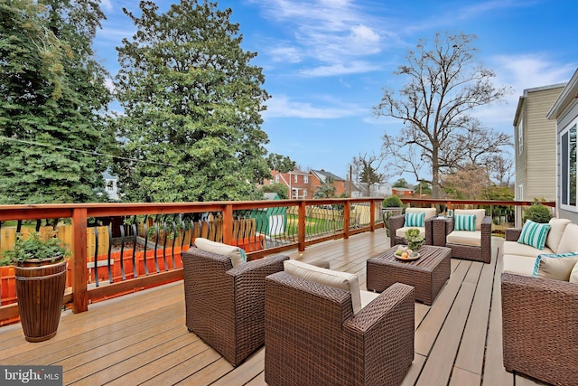 1133 46th St SE, Washington, DC 20019 - wooden deck with an outdoor living space