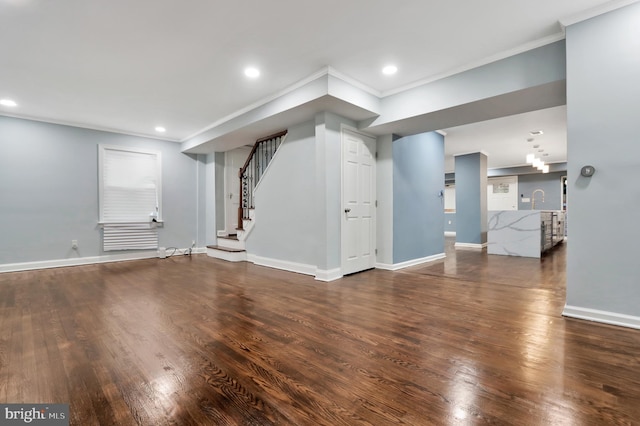 1133 46th St SE, Washington, DC 20019 - unfurnished living room featuring crown molding, wood finished floors, stairs, and recessed lighting