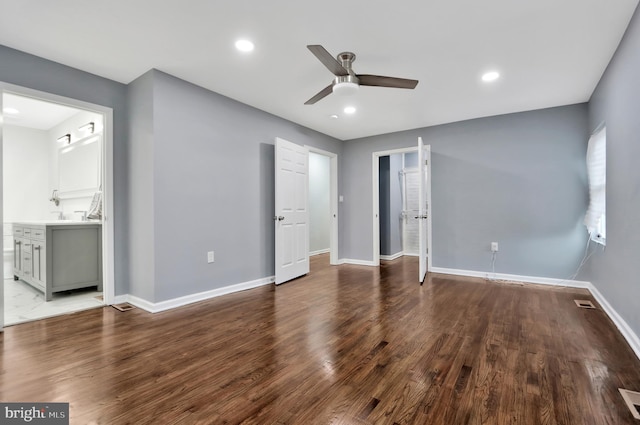1133 46th St SE, Washington, DC 20019 - unfurnished bedroom with wood finished floors, recessed lighting, connected bathroom, and a ceiling fan