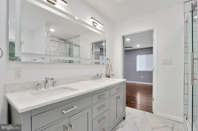 1133 46th St SE, Washington, DC 20019 - full bath featuring marble finish floors, double vanity, a tile shower, and recessed lighting
