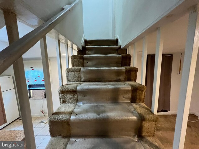 2817 Bookert Dr, Baltimore, MD 21225 - stairs with tile patterned flooring