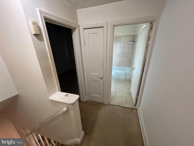 2817 Bookert Dr, Baltimore, MD 21225 - hall with carpet floors and a textured ceiling