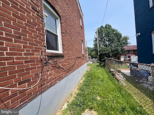 2817 Bookert Dr, Baltimore, MD 21225 - view of side of home with brick siding