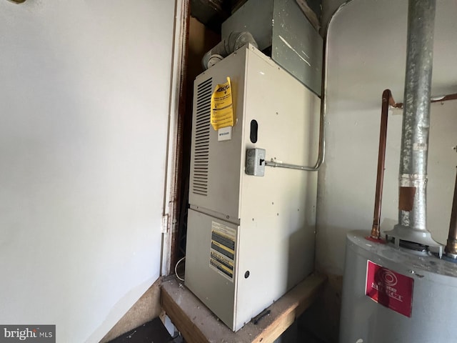 2817 Bookert Dr, Baltimore, MD 21225 - utilities with water heater and heating unit