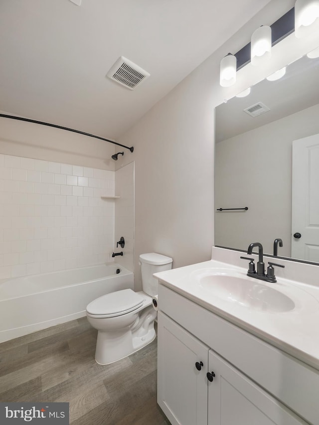 38 Preening Rd, Hedgesville, WV 25427 - bathroom with vanity, shower / bath combination, and wood finished floors