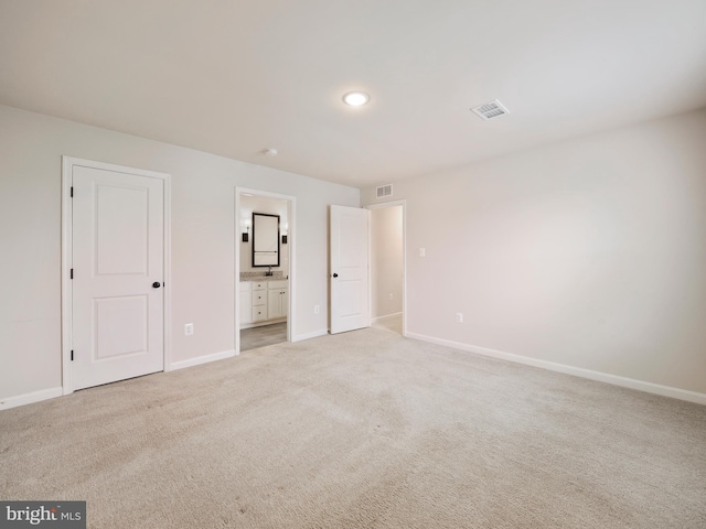38 Preening Rd, Hedgesville, WV 25427 - unfurnished bedroom featuring light colored carpet and ensuite bathroom