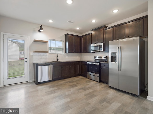 38 Preening Rd, Hedgesville, WV 25427 - kitchen featuring appliances with stainless steel finishes, dark brown cabinets, open shelves, light wood-type flooring, and recessed lighting