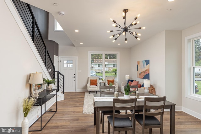 512 Marshall Ave, Pikesville, MD 21208 - dining room featuring a chandelier, wood finished floors, stairway, and recessed lighting