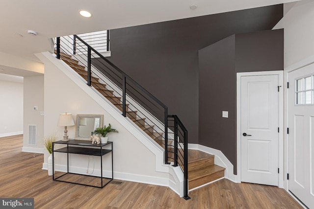 512 Marshall Ave, Pikesville, MD 21208 - staircase with wood finished floors and recessed lighting