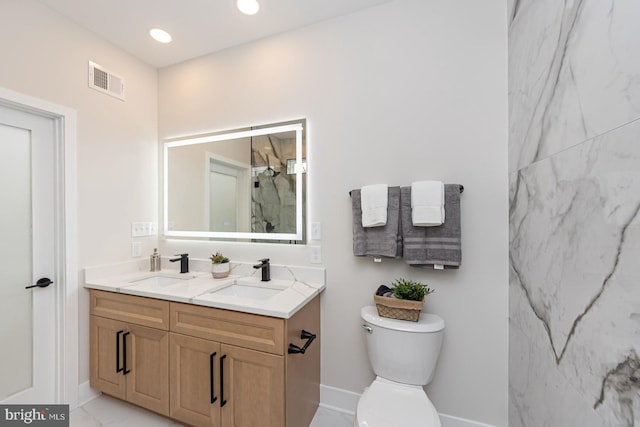 512 Marshall Ave, Pikesville, MD 21208 - bathroom with double vanity, a marble finish shower, marble finish flooring, and recessed lighting