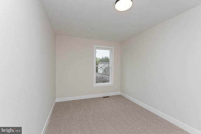 512 Marshall Ave, Pikesville, MD 21208 - empty room featuring light carpet and baseboards