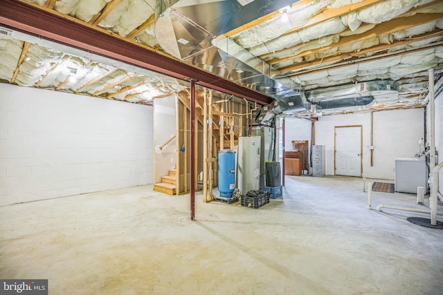 40534 Miss Ettas Way, Leonardtown, MD 20650 - unfinished below grade area with stairway, water heater, a water pressure tank, heating unit, and washer / dryer