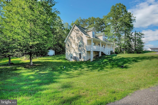 40534 Miss Ettas Way, Leonardtown, MD 20650 - view of home's exterior featuring a yard, a storage shed, stairs, and covered porch