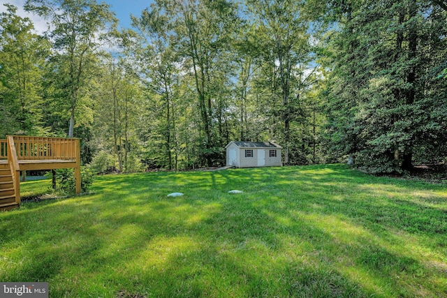 40534 Miss Ettas Way, Leonardtown, MD 20650 - view of grassy yard with an outbuilding, a wooden deck, and stairway