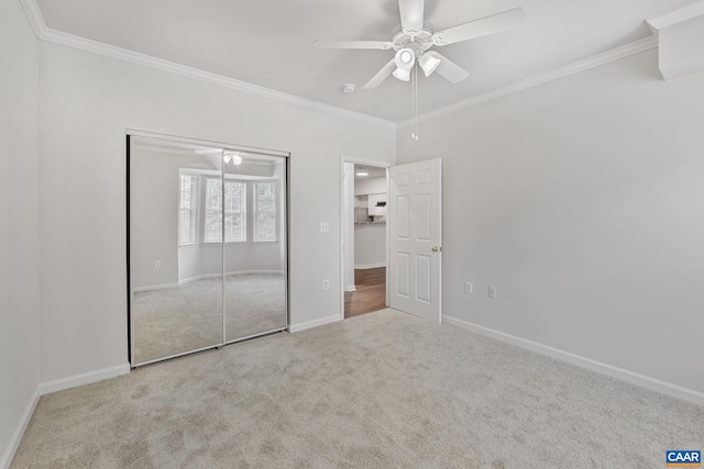 945 Dorchester Pl Unit 306, Charlottesville, VA 22911 - unfurnished bedroom with carpet, crown molding, a ceiling fan, and a closet