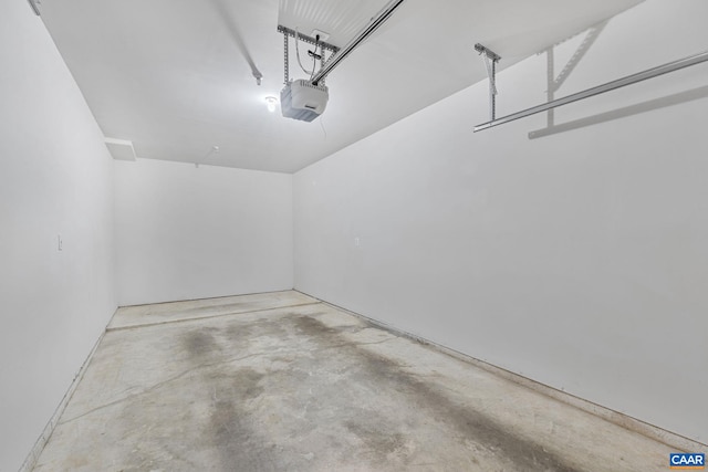 945 Dorchester Pl Unit 306, Charlottesville, VA 22911 - garage featuring a garage door opener