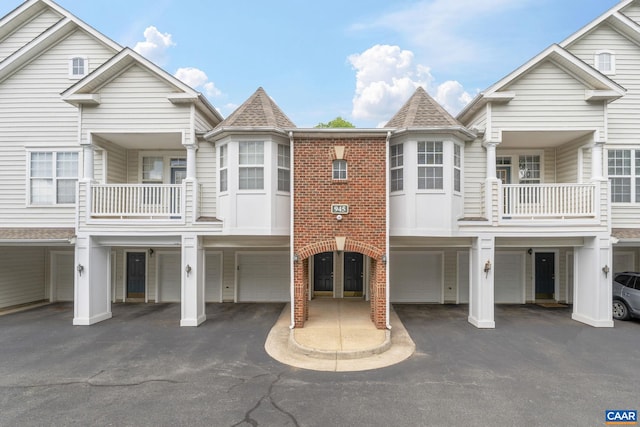945 Dorchester Pl Unit 306, Charlottesville, VA 22911 - multi unit property with an attached garage, driveway, and a shingled roof
