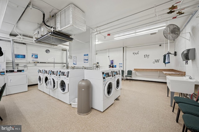 1030 E Lancaster Ave Unit 806, Bryn Mawr, PA 19010 - community laundry room with separate washer and dryer, estacked washer and dryer, and a garage