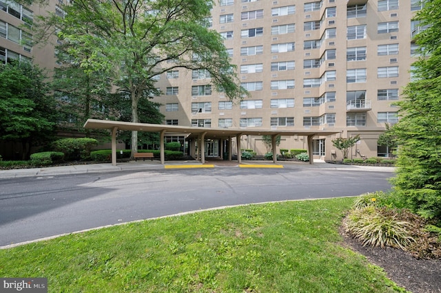 1030 E Lancaster Ave Unit 806, Bryn Mawr, PA 19010 - view of apartment building / complex featuring uncovered parking