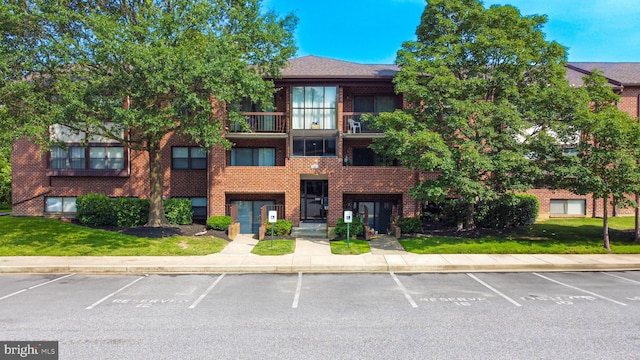 19 Juliet Ln Unit 103, Baltimore, MD 21236 - view of building exterior with uncovered parking