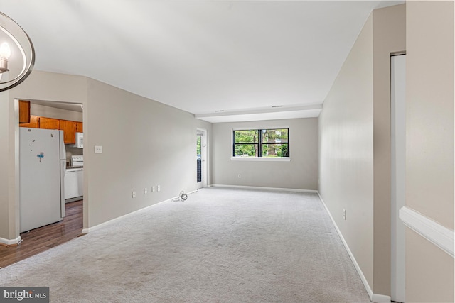 19 Juliet Ln Unit 103, Baltimore, MD 21236 - unfurnished living room featuring carpet and a chandelier