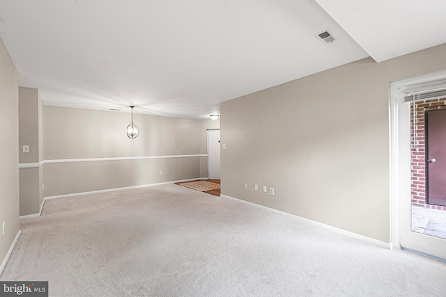 19 Juliet Ln Unit 103, Baltimore, MD 21236 - carpeted empty room featuring baseboards and a chandelier