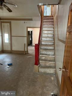 324 W Huntingdon St, Philadelphia, PA 19133 - staircase with a ceiling fan and baseboards