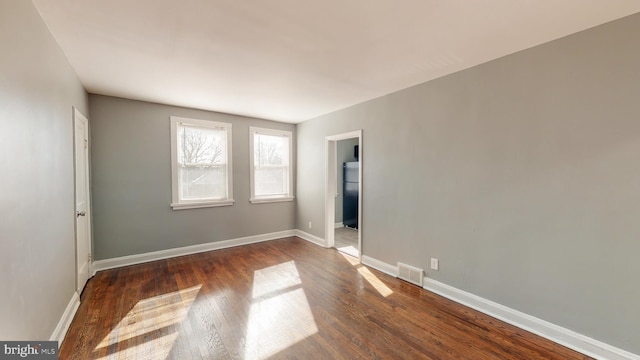 1126 Gleneagle Rd, Baltimore, MD 21239 - spare room featuring wood finished floors and baseboards